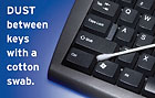 Dust between keys with a cotton swab.